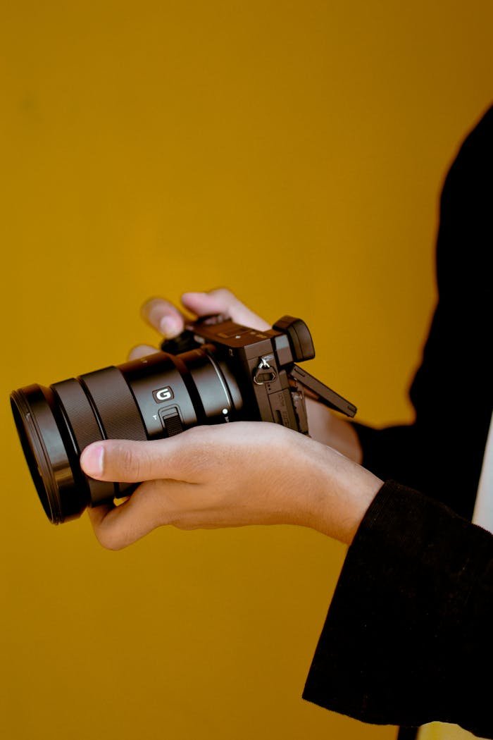 Hands Holding Camera